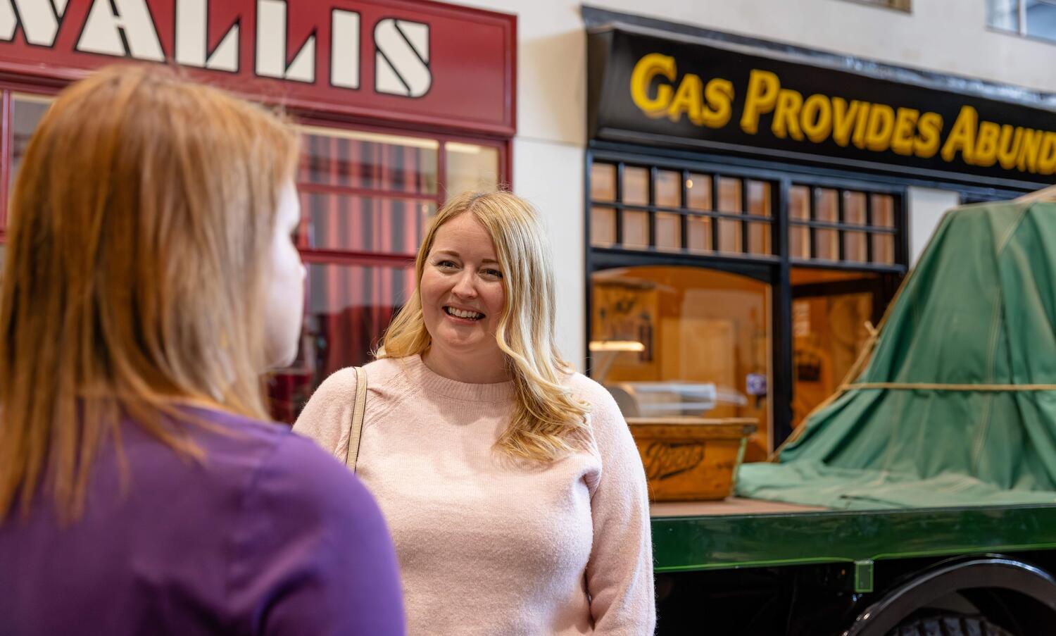 Two female friends visiting Milestones Museum 