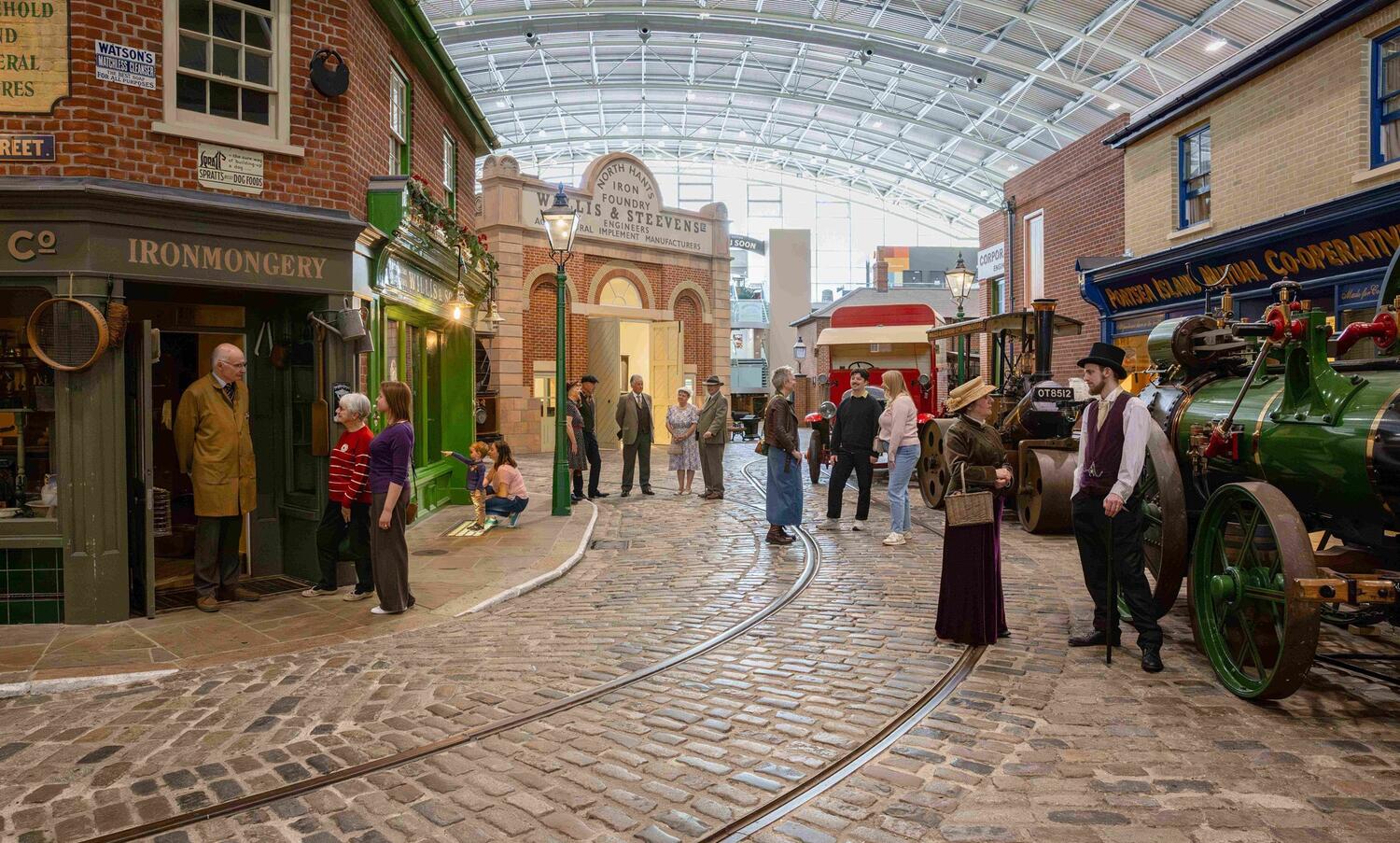 Busy indoor street scene on museum floor