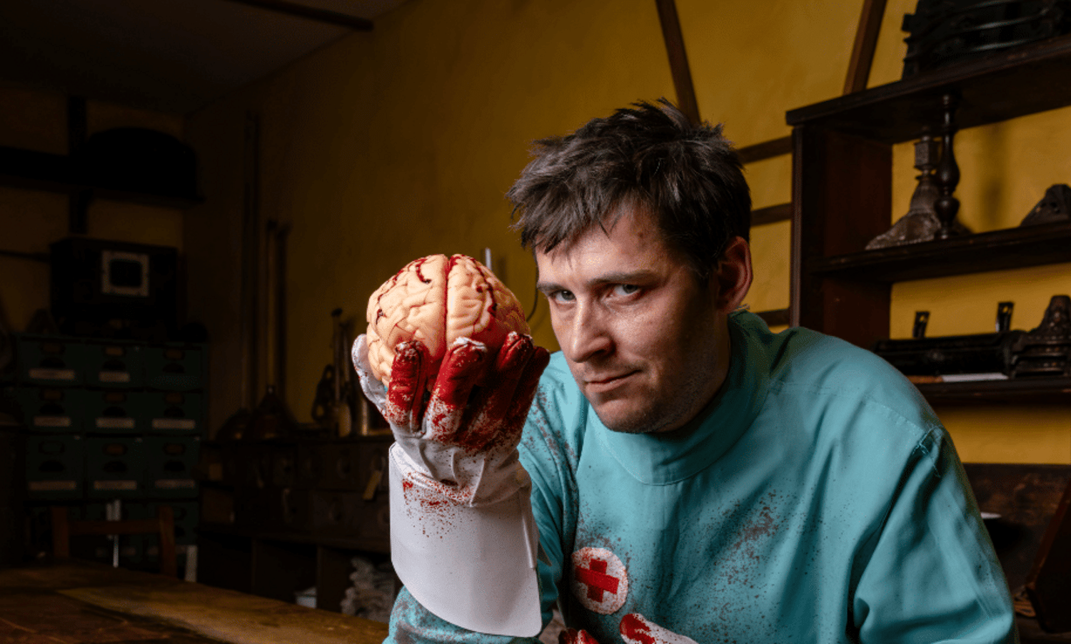 Halloween Doctor with a bloody brain in hand