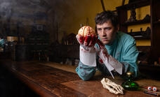 Spooky Physician inspecting a brain