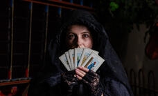 Mystic showing tarot cards