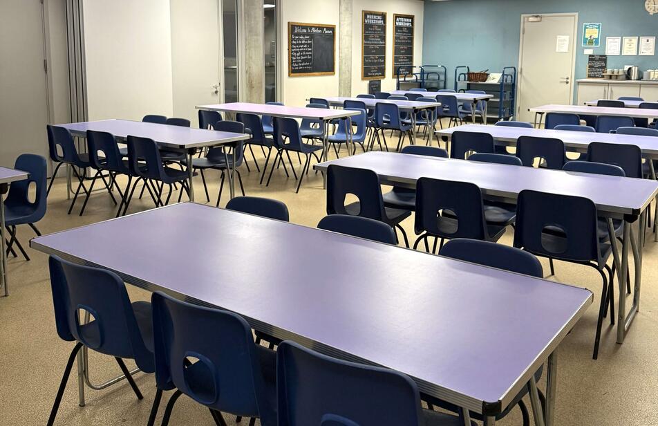 tables and chairs in a meeting room
