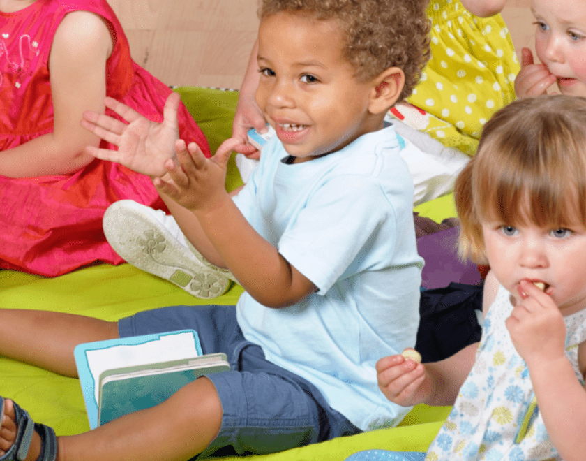Children participating in rhyme class